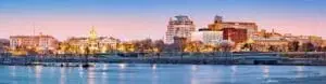 PENNSAUKEN,NJ City skyline at sunset over water,10 good reason to hire a local moving company